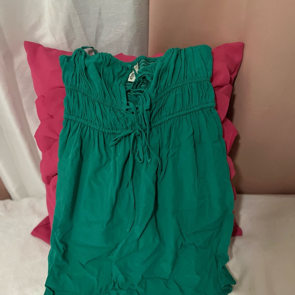 green suit from the Gitana suitcase store.